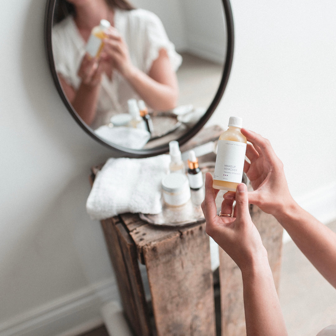 makeup remover tamanu rosewood in front of face care products